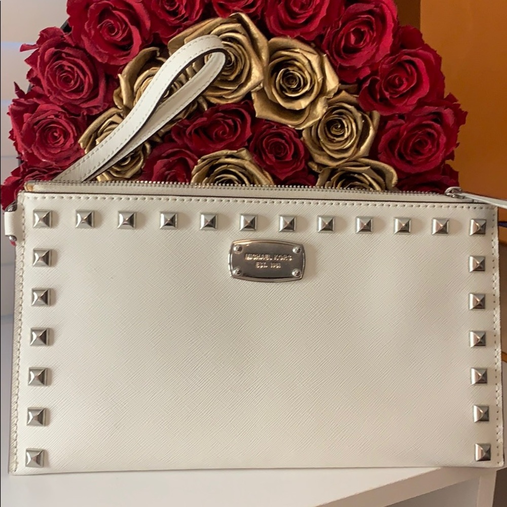 Michael Kor’s studded wristlet